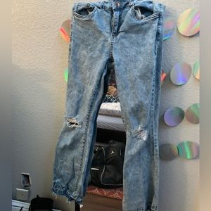boot leg low rise jeans, light wash , ripped at knees(came like that)